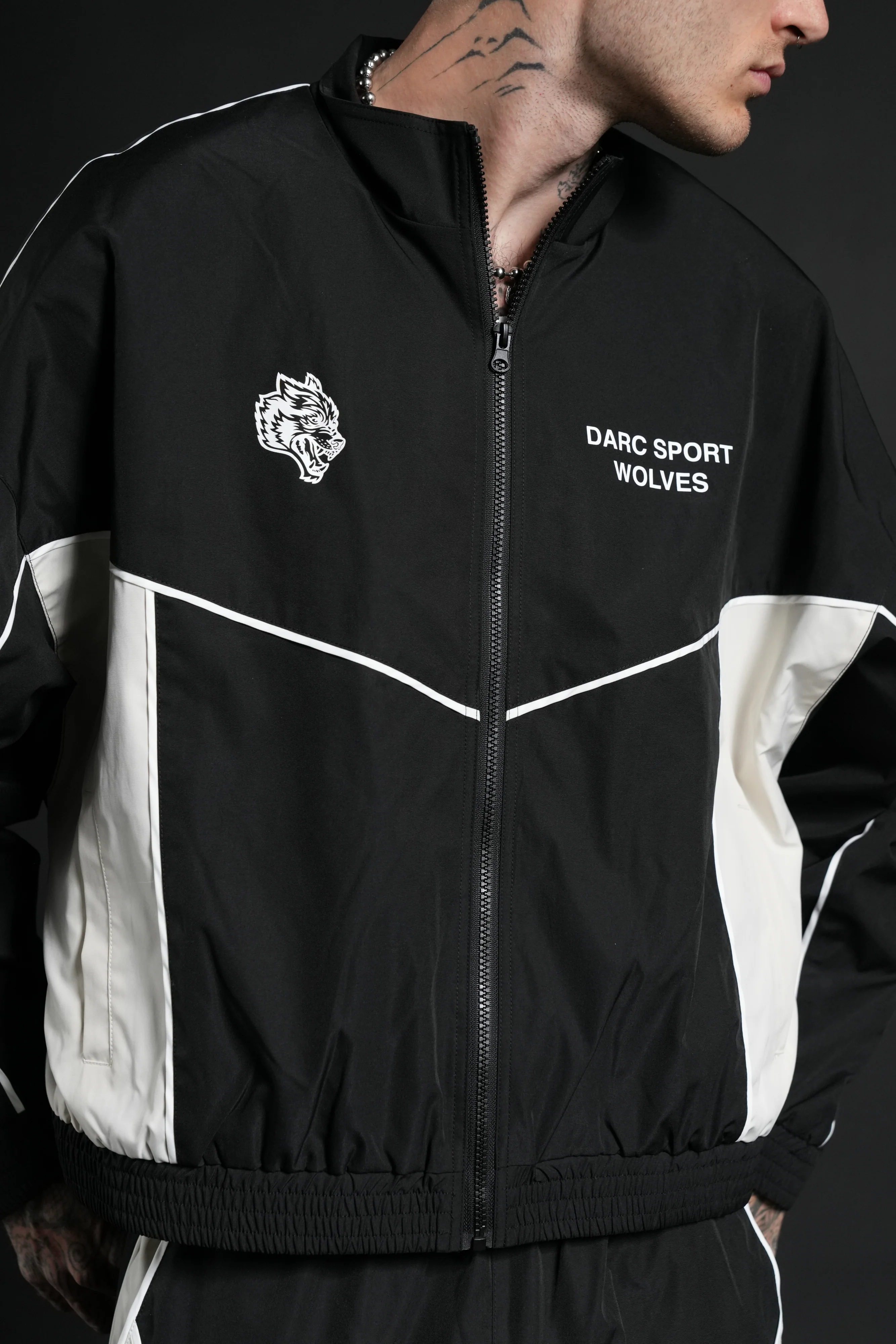 Darc Sport Wolves Unisex Pyramid Quinn Track Jacket in Black/Sand - Image 8