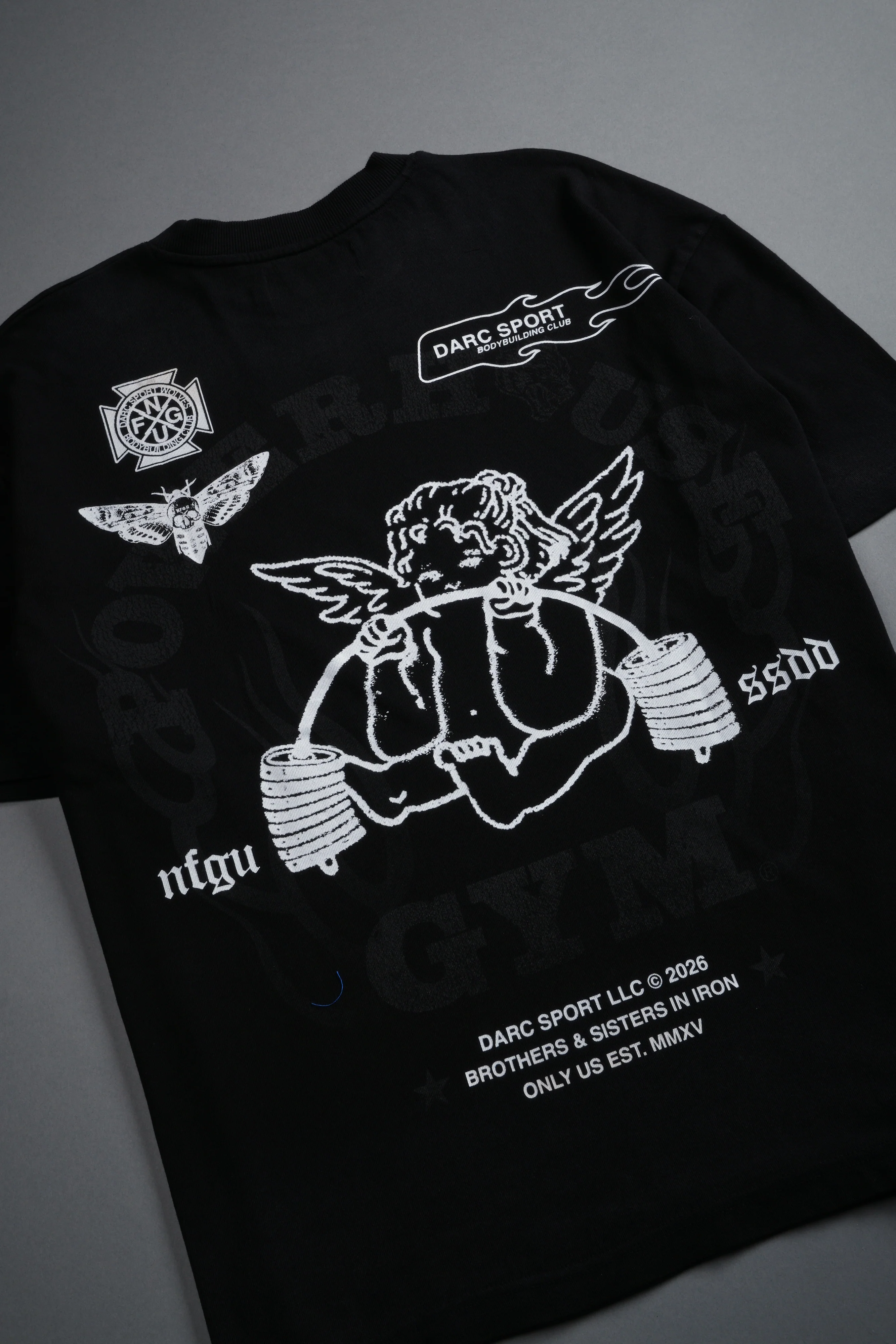Powerhouse of the Cherub Unisex Premium Oversized Tee in Black Drift Wash - Image 10