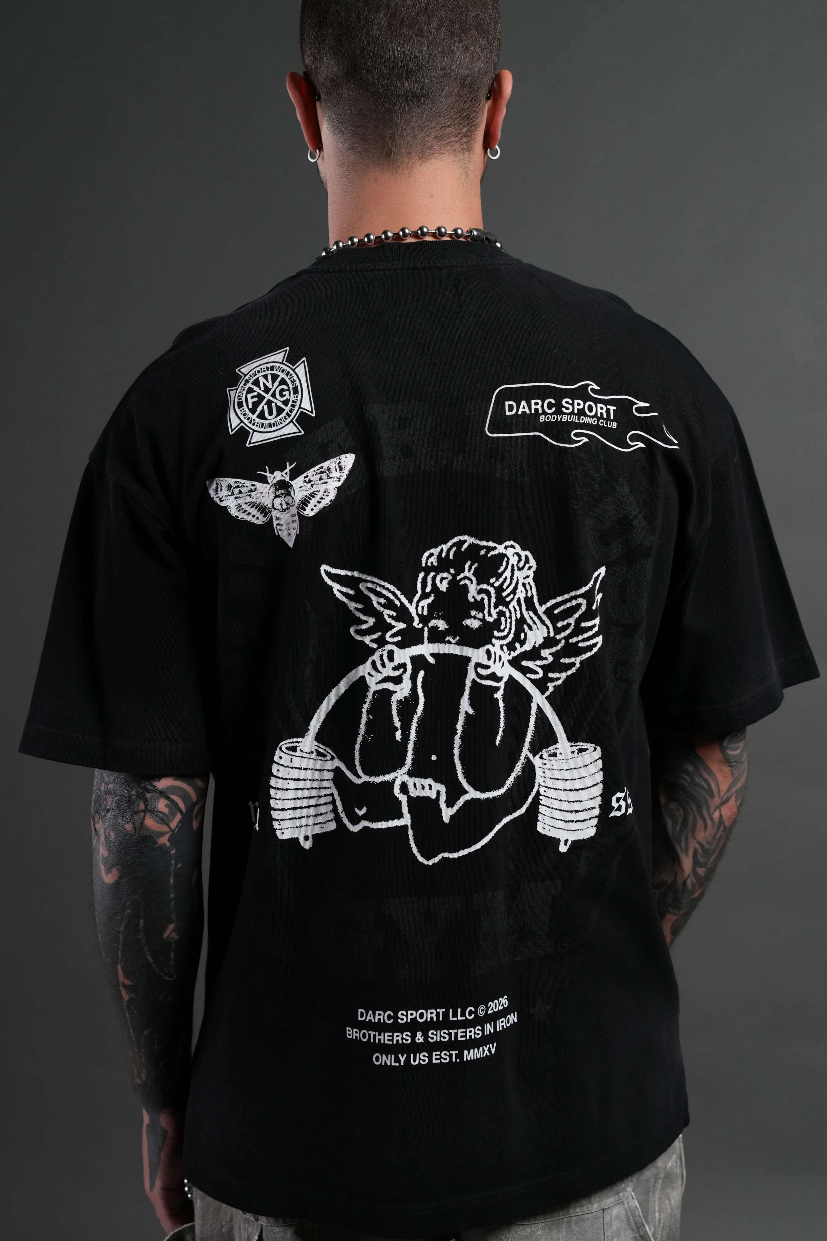 Powerhouse of the Cherub Unisex Premium Oversized Tee in Black Drift Wash - Image 8
