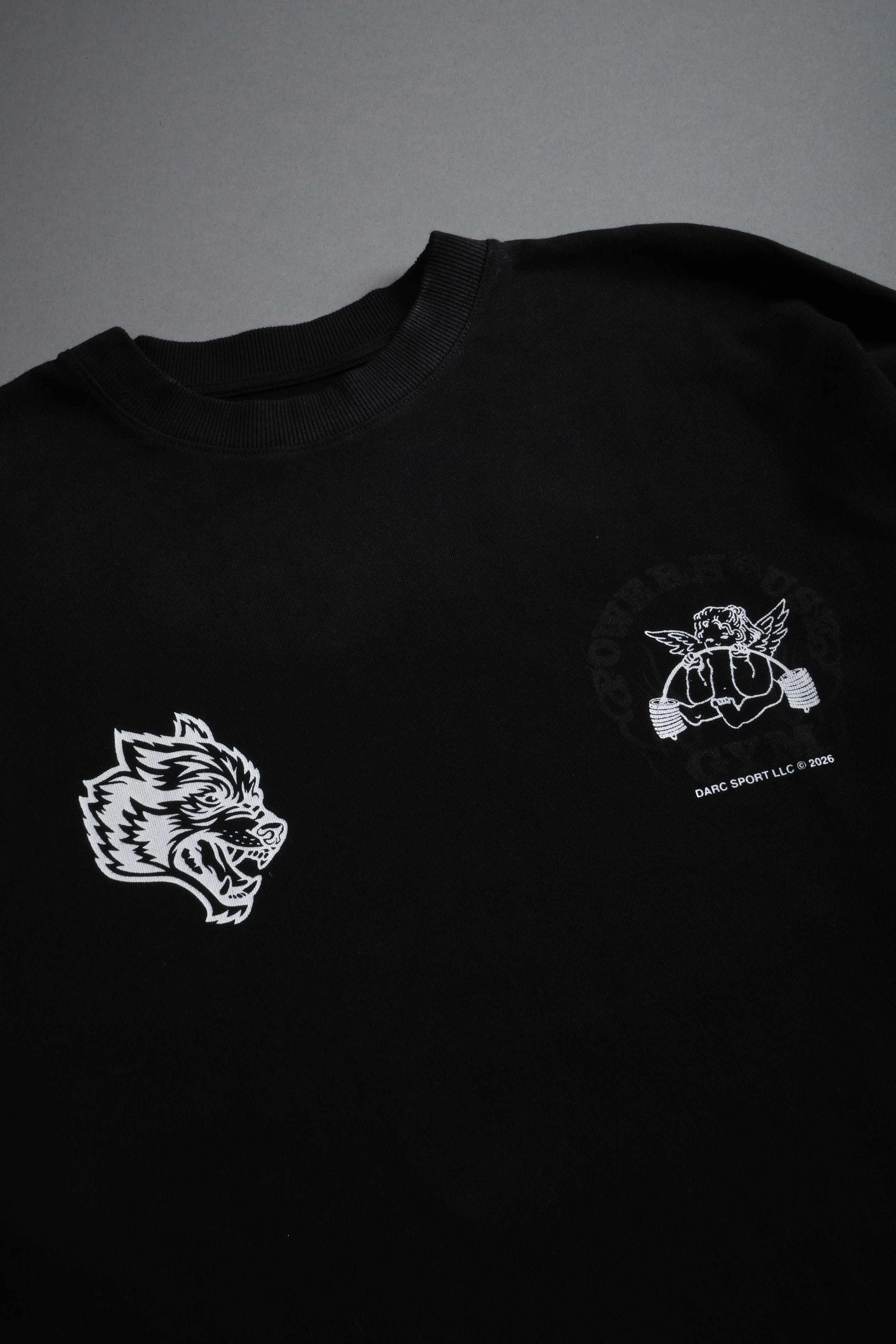Powerhouse of the Cherub Unisex Premium Oversized Tee in Black Drift Wash - Image 9