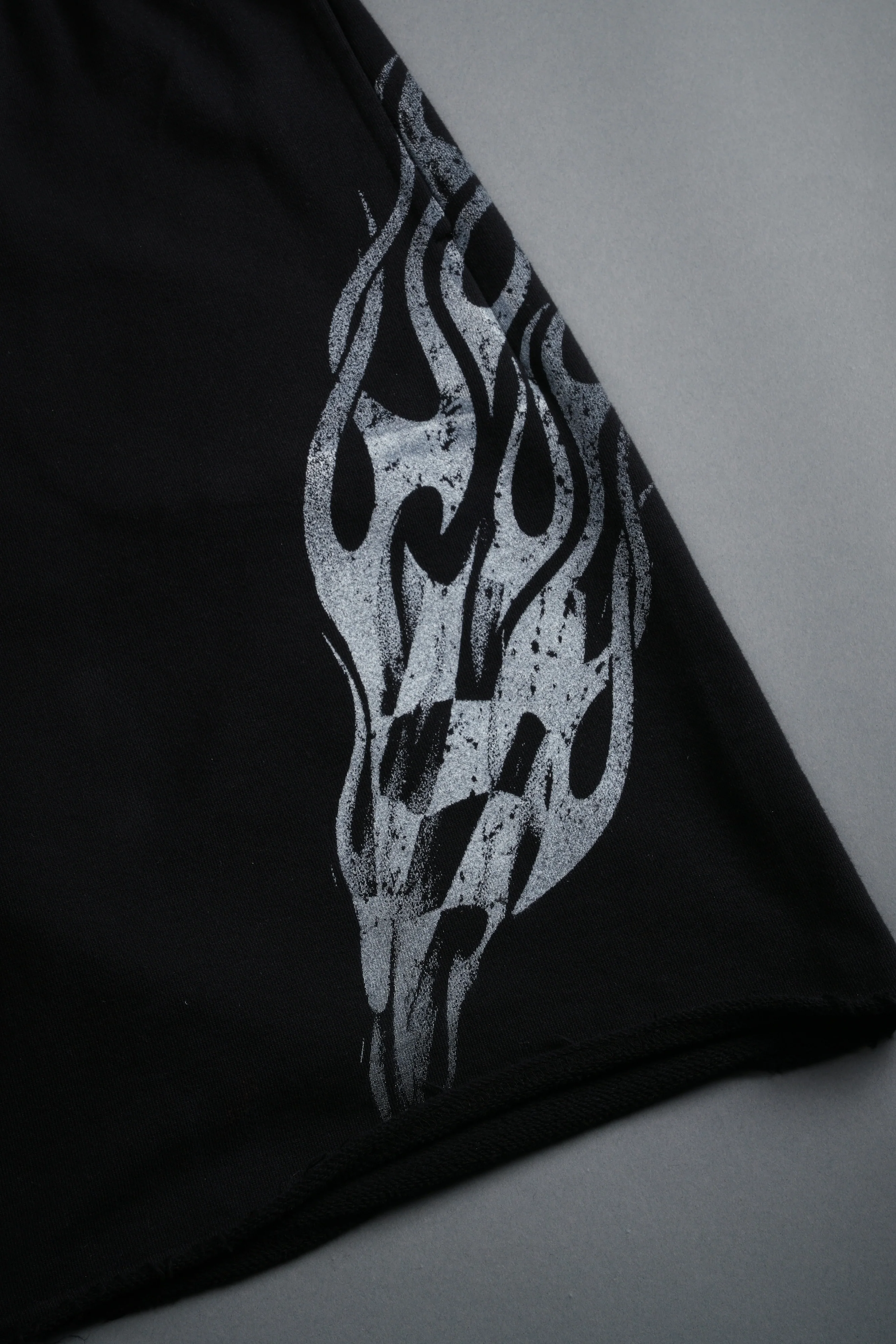 Race Inferno Grunge Oversized Raw Hem Post Lounge Sweat Shorts in Black - Image 5